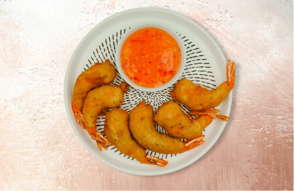 Golden deep-fried prawns delicately dipped in our signature batter, delivering a crispy, flavorful crunch.